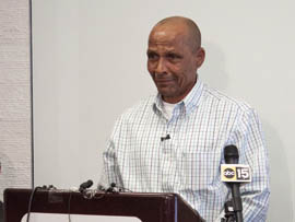 Louis Taylor tears up at a news conference in Phoenix, the day after his release after more than 40 years in prison. He said called the 1970 hotel fire deaths of 29 people and his subsequent conviction for them 