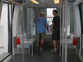 Some of the first passengers get a look at the new PHX Sky Train.