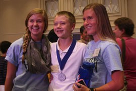 National Spelling Bee semifinalist Christopher O'Connor with his sisters, Michelle and Jennifer. The seventh-grader's family has been cheering him on at the bee.