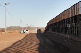 Moroney's ranch comes within 20 miles of the southern border fence of the United States, pictured here along the Naco, Ariz., region of the fence.