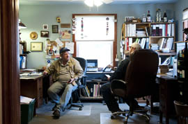 Jim Bittner and his son Kevin discuss orders for the farm at office in Appleton, N.Y. Kevin, 29, is an orchard manager responsible for new plantings and orchard development at the farm.