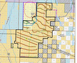 The wind-power farm proposed near Kingman has been scaled back from earlier versions, marked by purple dotted lines on the map, to protect neighbors and golden eagles in the area.