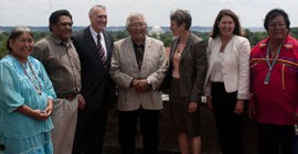 Interior Secretary Sally Jewell and White Mountain Apache Chairman Ronnie Lupe, center, after the signing of a water-rights agreement. With them are, from left, Apache Council members Theresa Larzelere and Gregg Henry, former Arizona Sen. Jon Kyl , Rep. Ann Kirkpatrick, D-Flagstaff, and Apache Council member Kino Torino.