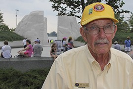 Ray Cullom, 76, a National Park Service volunteer, helps at the Martin Luther King Jr. Memorial during events nearby marking the 50th anniversary of King's 