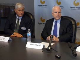 Jim Lundy, CEO of Alliance Bank, listens as U.S. Sen. John McCain, R-Ariz., discusses immigration reform with Arizona business leaders during a round table Wednesday.