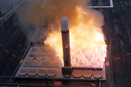 A Tomahawk cruise missile launches from the forward deck of the guided missile destroyer USS Farragut during an August 2009 training exercise in the Atlantic Ocean.