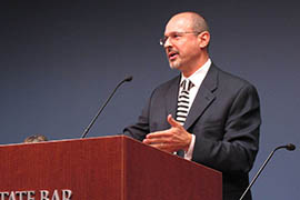 John Tuchi speaks at a State Bar of Arizona event in Phoenix in October 2011.