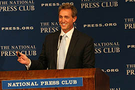 Sen. Jeff Flake, R-Ariz., jokes during the the National Press Club's Centennial Spelling Bee, which pitted lawmakers against journalists.