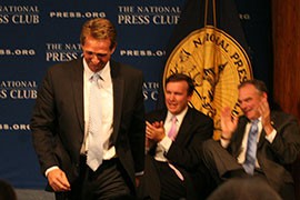 Sen. Jeff Flake, R-Ariz., leaves the stage after misspelling the word “malfeasance” during the National Press Club's Centennial Spelling Bee.