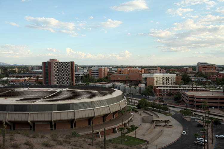 Solar panels cover the roof of Arizona State University's Wells Fargo Arena, site of basketball and volleyball games as well as other sporting events. A national organization cited efforts at ASU and the University of Arizona in a report on sustainability in college athletics.