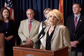 Gov. Jan Brewer addresses a news conference explaining her appeal of the Obama administration's rejection of a federal disaster declaration for fire-ravaged Yarnell.