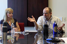 Will Humble, director of the Arizona Department of Health Services, makes a point during an interview Wednesday with Cronkite News Service. Sheila Sjolander, assistant director, public health services, is at left.