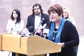 State Sen. Linda Lopez, D-Tucson, shown at a January news conference, authored a law that allows schools to stock and administer injectable epinephrine when students go into anaphylaxis from previously undiagnosed allergies.