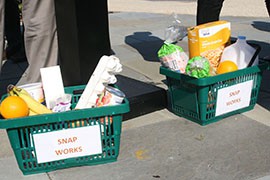 At a Capitol Hill rally against the food stamp cuts, Democratic lawmakers displayed baskets that they said held $36 worth of food - the amount of benefits scheduled to be cut from Supplemental Nutriition Assistance Benefits fror a family of four.