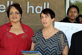 Diane Brown, with Avondale Mayor Marie Lopez Rogers at left, addresses a news conference announcing an effort to inform young Arizonans about their options under the federal health insurance exchange.