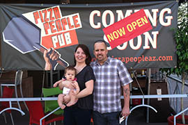 MaryBeth Scanlon and her husband, Tim Scanlon, shown with their daughter, recently expanded from a mobile kitchen into a downtown pub and restaurant.