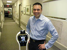 Dr. Bert Vargas, a Mayo Clinic neurologist, demonstrates V-Go.