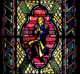 Congress' complicated relationship with religion is seen in the stained-glass of the Congressional Prayer Room, a little known room in the Capitol for lawmakers' use. Despite the trappings of a traditional chapel, there are secular touches such as this image of George Washington.