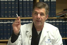 Dr. Frank LoVecchio, co-medical director of the Banner Good Samaritan Poison & Drug Information Center, displays an electronic cigarette.
