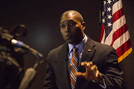 U.S. Associate Attorney General Tony West speaks to reporters at a public hearing about American Indian and Alaska Native children's exposure to violence. The hearing, held at Talking Stick Resort on the Salt-River Pima Maricopa Indian Reservation, is one of four to be held in the coming year by an advisory committee.