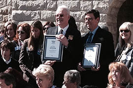 Rep. John Kavanagh, R-Fountain Hills, at left, and Sen. Steve Farley, D-Tucson, receive awards from the Human Society of the United States.