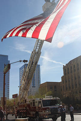 Thursday's ceremony honored two Phoenix firefighters and a police officer who died in the line of duty in 2013, among 73 deaths of employees in the city's history.