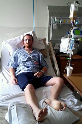 Jamie Ison is shown during his hospitalization for treatment of the H1N1 strain of the flu virus. Officials say this year's dominant flu strain is especially harmful to younger people.