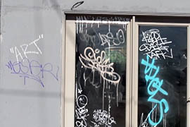 Graffiti mars a wall on a downtown Phoenix building.