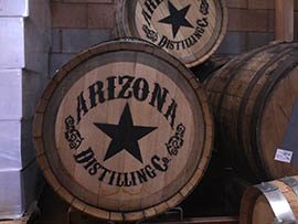 Oak barrels hold whiskey at Arizona Distilling Co. in Tempe.