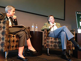 Michael Lewis, who received the Society of American Business Editors and Writers’ Distinguished Achievement Award on Friday, talks with business journalist and author Diana B. Henriques at the group's spring conference.