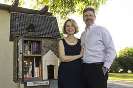 Barbara Hinske, with her husband, Brian Willis, added a Little Free Library outside her downtown Phoenix home.