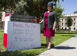 Sara Presler, CEO of the Arizona Foundation for Women, rallies outside the State Capitol for National Equal Pay Day.