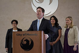 Phoenix Mayor Greg Stanton announces an effort to require city contractors to provide equal pay for women and men. Joining him are (from right) Councilwoman Kate Gallego, Councilwoman Laura Pastor and Marie Sullivan, CEO of Arizona Women’s Education & Employment Inc.