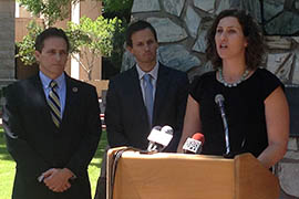 Serena Unrein, public interest advocate for the Arizona Public Interest Research Group, discusses a report giving the state a B in spending transparency. Joining her (from left) are Rep. Darin Mitchell, R-Litchfield Park, and Scot Mussi, executive director of the Arizona Free Enterprise Club.