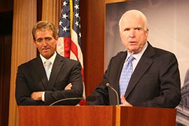 Arizona Sens. Jeff Flake, left, and John McCain joined other Republican lawmakers proposing a bill that would give veterans a choice other than the Department of Veterans Affairs for their health care. Senate Democrats have introduced a similar bill.