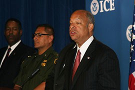 Homeland Security Secretary Jeh Johnson touted progress in the fight against a tide of Central American immigrants, many of them children. Numbers of kids caught are falling and the time it takes to deport an adult is also dropping, he said.