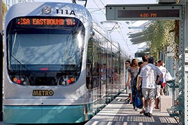 Riders board the light rail at the University and Rural station in Tempe. Light-rail ridership has already reached numbers projected for 2020, said a report from the Arizona Public Interest Research Group, helping drive an overall mass transit increase in the state.