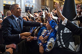 President Barack Obama greets audience members after remarks at the 2013 Tribal Nations Conference at the Interior Department on Nov. 13, 2013. It was the fifth annual conference bringing together federal officials and leaders from all 566 federally recognized tribes.
