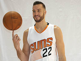 Phoenix Suns center Miles Plumlee poses during the team's media day Monday.