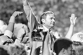 Players carry Frank Kush off the field after his final game coaching Arizona State football in 1979, an upset win over Washington.