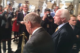 Sen. John McCain, R-Arizona, heads through Statuary Hall on his way to the House chamber for President Barack Obama's State of the Union address Tuesday.