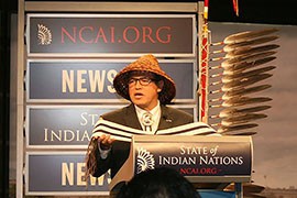 National Congress of American Indians President Brian Cladoosby holds a replica of a wampum belt at the conclusion of his State of Indian Nations address.