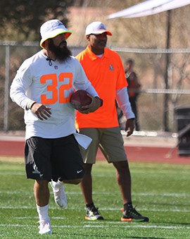 San Diego Chargers safety Eric Weddle plays around with a football during a Team Irvin, Pro Bowl practice on Friday.