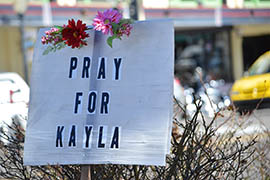 A sign in Prescott urges support for Kayla Mueller, whose family said Tuesday it had received confirmation that she had died as a captive of the Islamic State group.