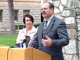 Byron Schlomach, director of the Center for Economic Prosperity at the Goldwater Institute, and Diane Brown, executive director of the Arizona Public Interest Research Group, hold a news conference Wednesday on a report giving Arizona a grade of B in government spending transparency.