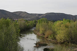 The Verde River, shown flowing near Clarkdale, is the subject to conflicting claims over water rights. The Arizona Department of Water Resources is tasked with providing research to courts adjudicating the cases.