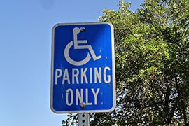 Special parking was one of the first, and most visible parts of the 25-year-old Americans with Disabilities Act. Advocates praise the ADA, but say more still needs to be done.