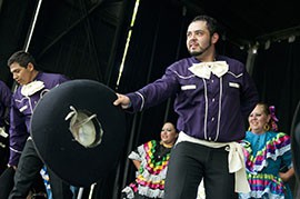 Angel Montanez dances with Ballet Folklorico La Paloma, a Tucson-based group that was invited to perform at the Island Gardens Festival in London on Saturday, July 28, 2012.