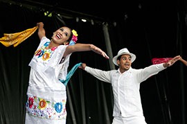 Cristina Ramirez and Frankie Grijalva of Viva Arizona, a dance group from Tucson, Ariz., perform at Island Gardens Park in London.