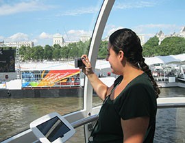 Marissa Feiwus of West Caldwell, N.J., looks out on the the Thames River while taking a ride on the London Eye on Saturday, July 28, 2012.